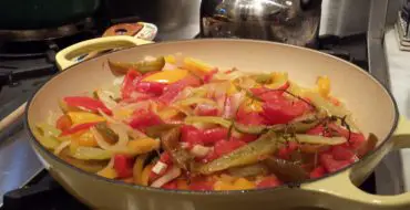 Slowly braised tomatoes, peppers, onions and piment d'espelette become Basque dish Piperade