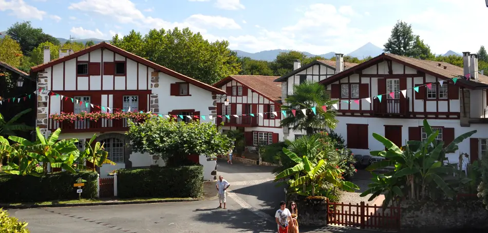 Houses in the Basque country with read and green shutters