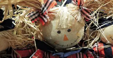 Header photo straw-stuffed doll