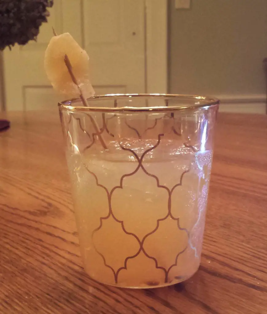 Penicillin Cocktail garnished with candied ginger