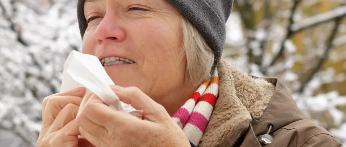 woman with dry lips and tissue in winter