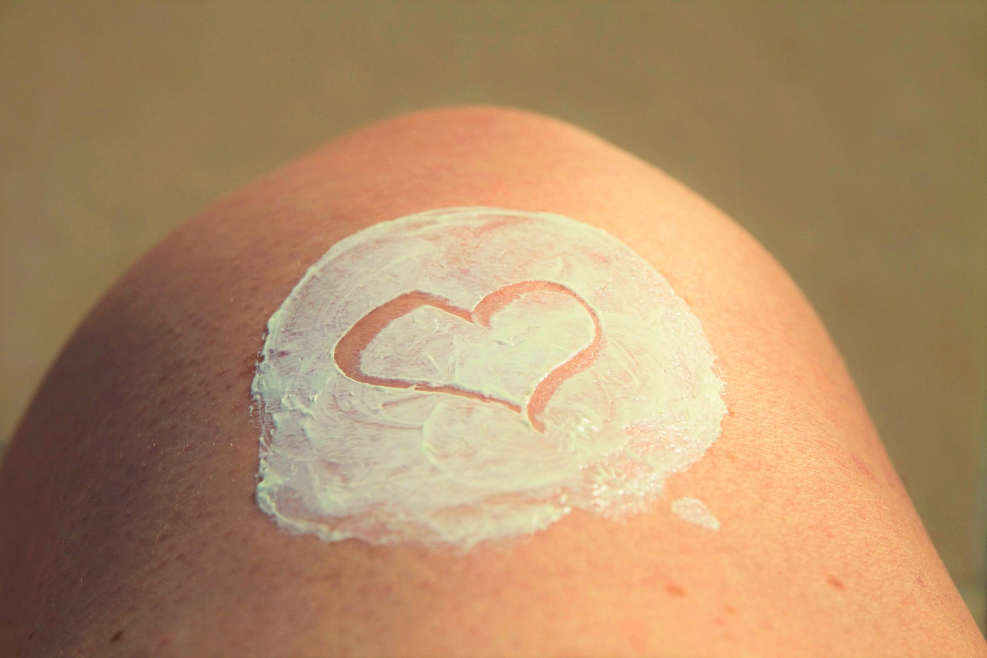 sunscreen with heart on knee
