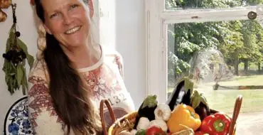 Mary Pochez with vegetables from her chateau garden
