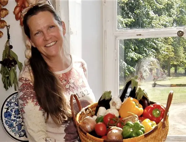 Mary Pochez with vegetables from her chateau garden