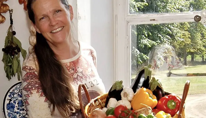 Mary Pochez with vegetables from her chateau garden