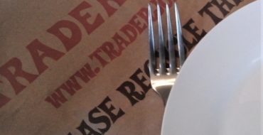 Trader Joe's paper bag, dish and fork