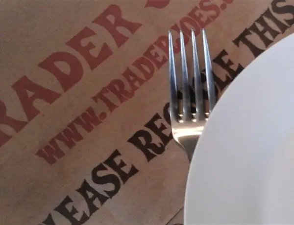 Trader Joe's paper bag, dish and fork