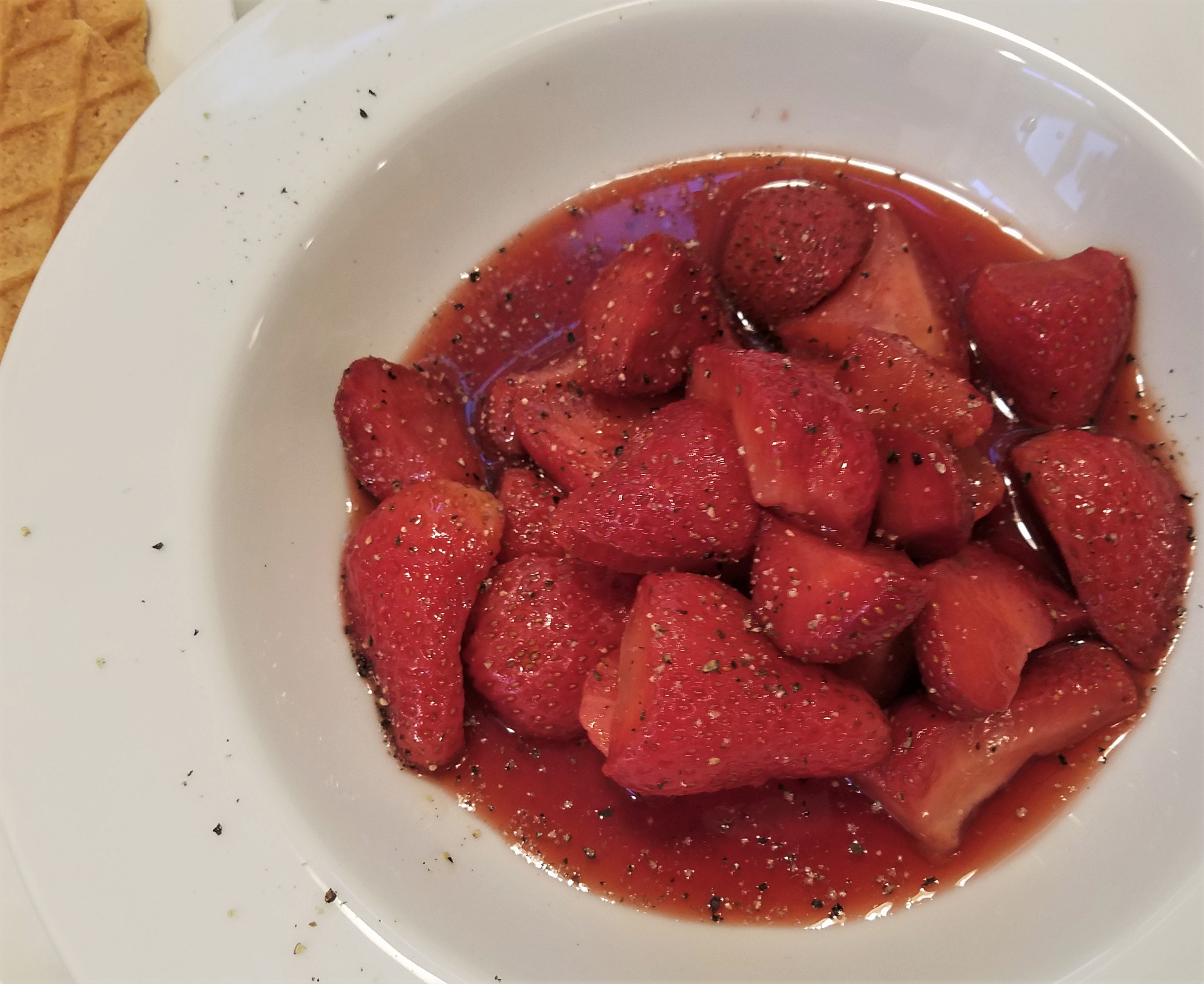 Strawberries with red wine and black pepper