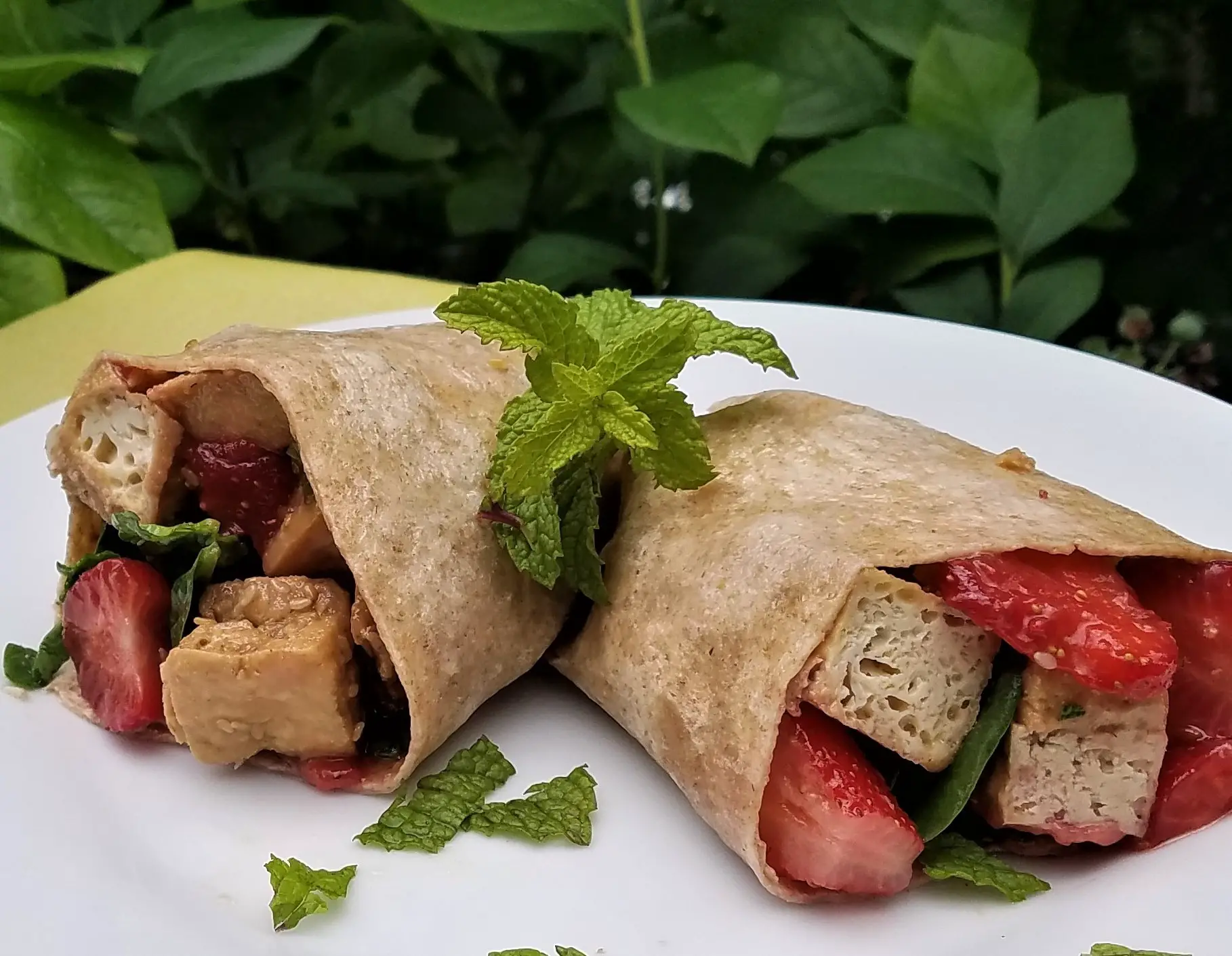 Wrap sandwich with strawberries, spinach and tofu