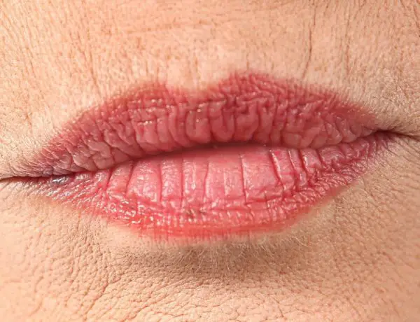 senior woman wtih lipstick lines