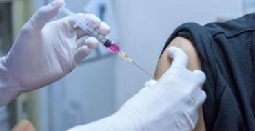 Woman getting flu shot