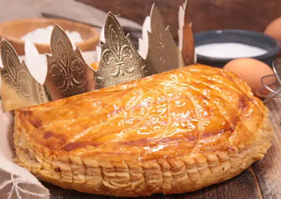 Galette des rois with gold paper crown