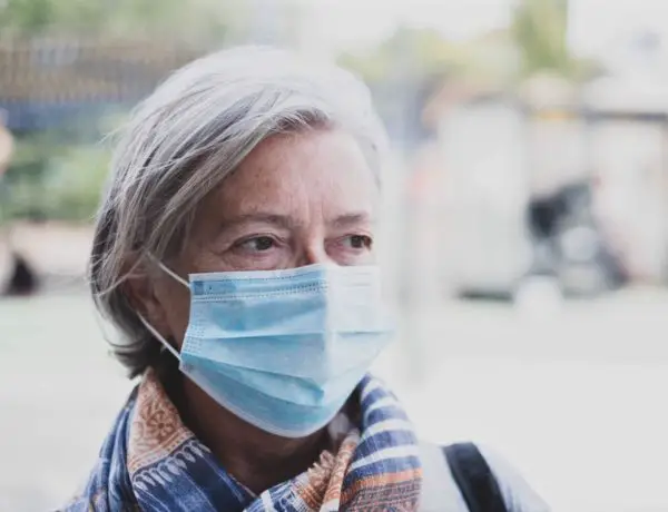 Mature woman with face mask coronavirus