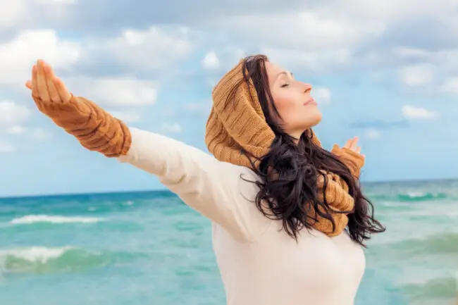 Woman taking deep breath