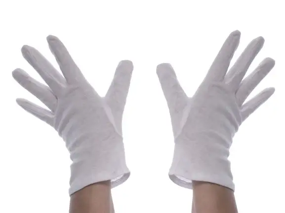 Hands in white gloves hand mask