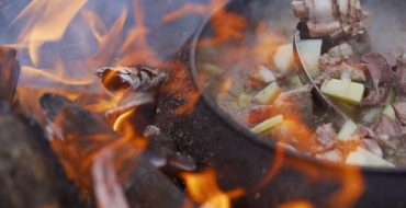 beef stew over fire
