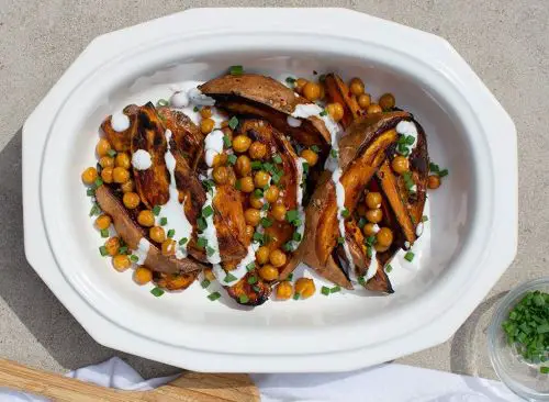 Roasted sweet potatoes and chickpeas are a Thanksgiving vegetarian option