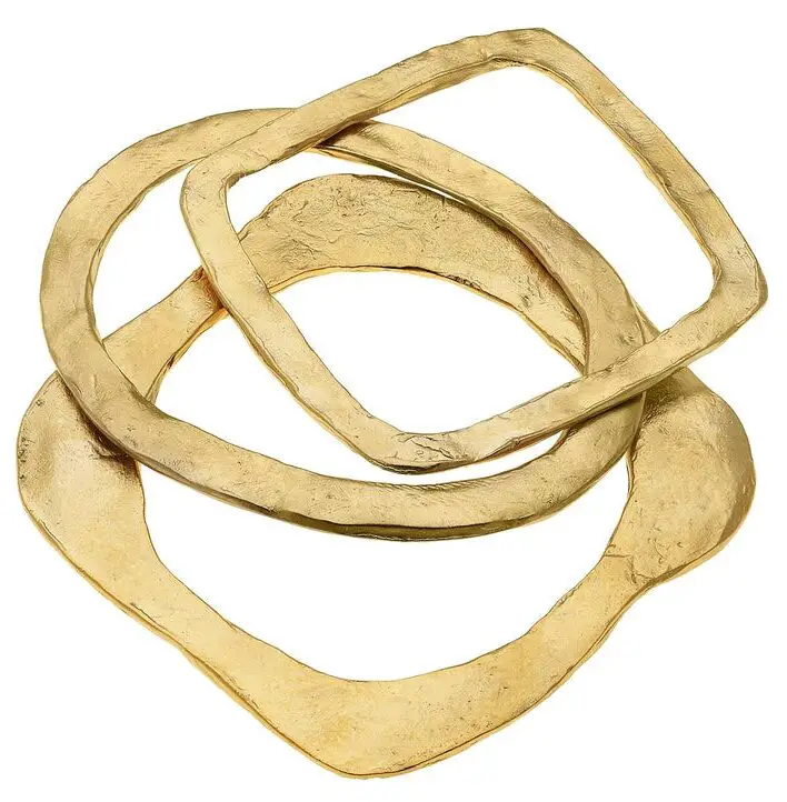 three gold bangles