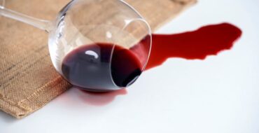 Spilled glass of red wine