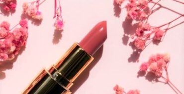 Tube of spring lipstick with flowers