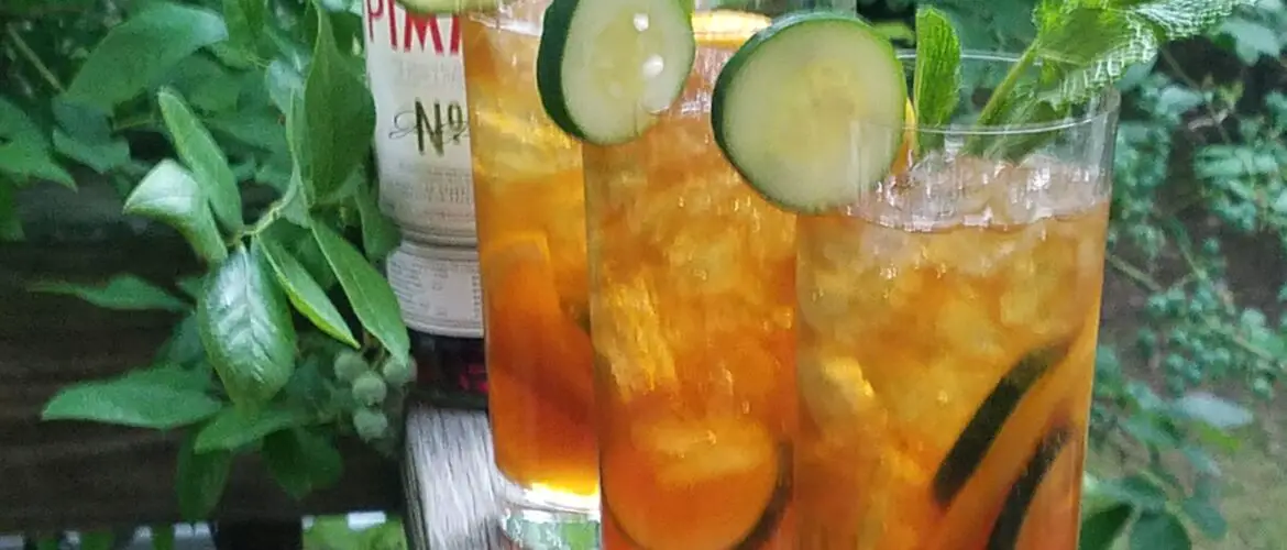 Three traditional PIMMS cocktails with