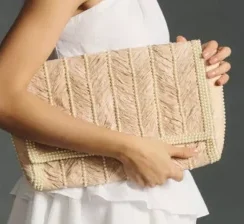 pearl studded straw clutch