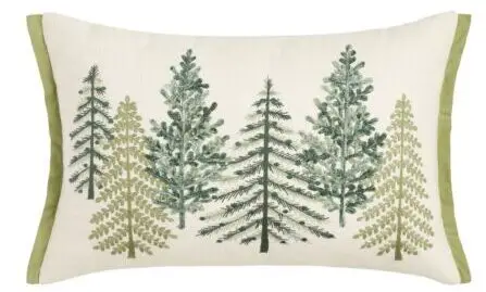 Ivory pillow with green beaded trees