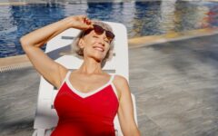 Senior woman in red swimsuit