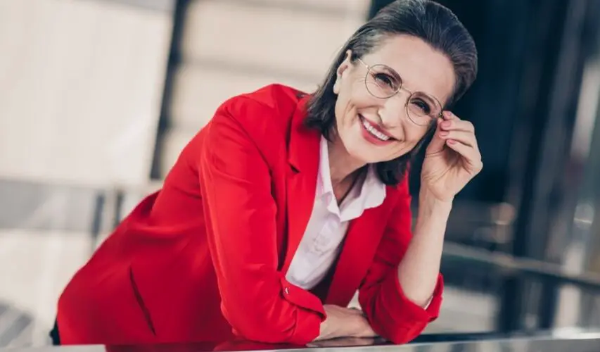 Attractive senior woman in red jacket