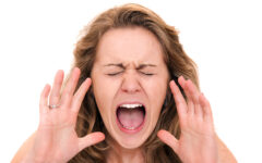 Woman screaming close up