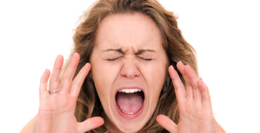 Woman screaming close up