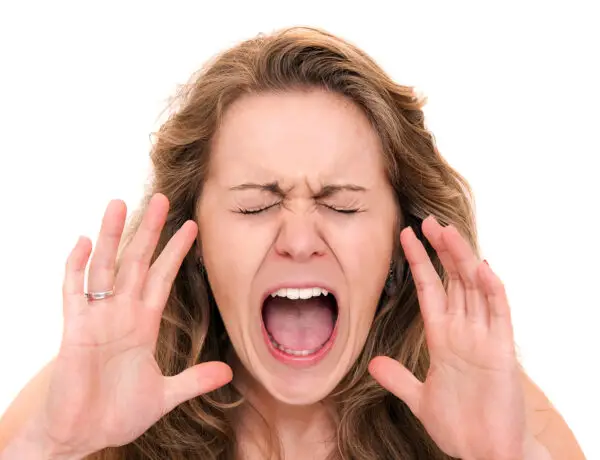 Woman screaming close up