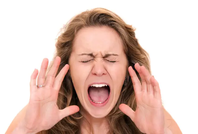 Woman screaming close up