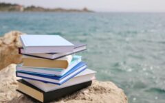 Stack of books on rock summer