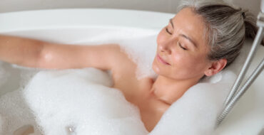 Senior woman relaxing in bath